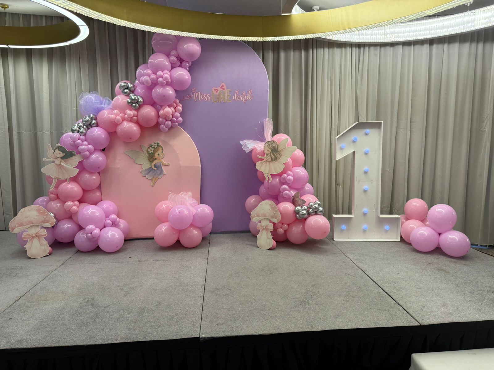 Pink balloon entrance for birthday setup